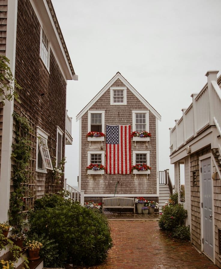 American flag on a shingle home exterior
