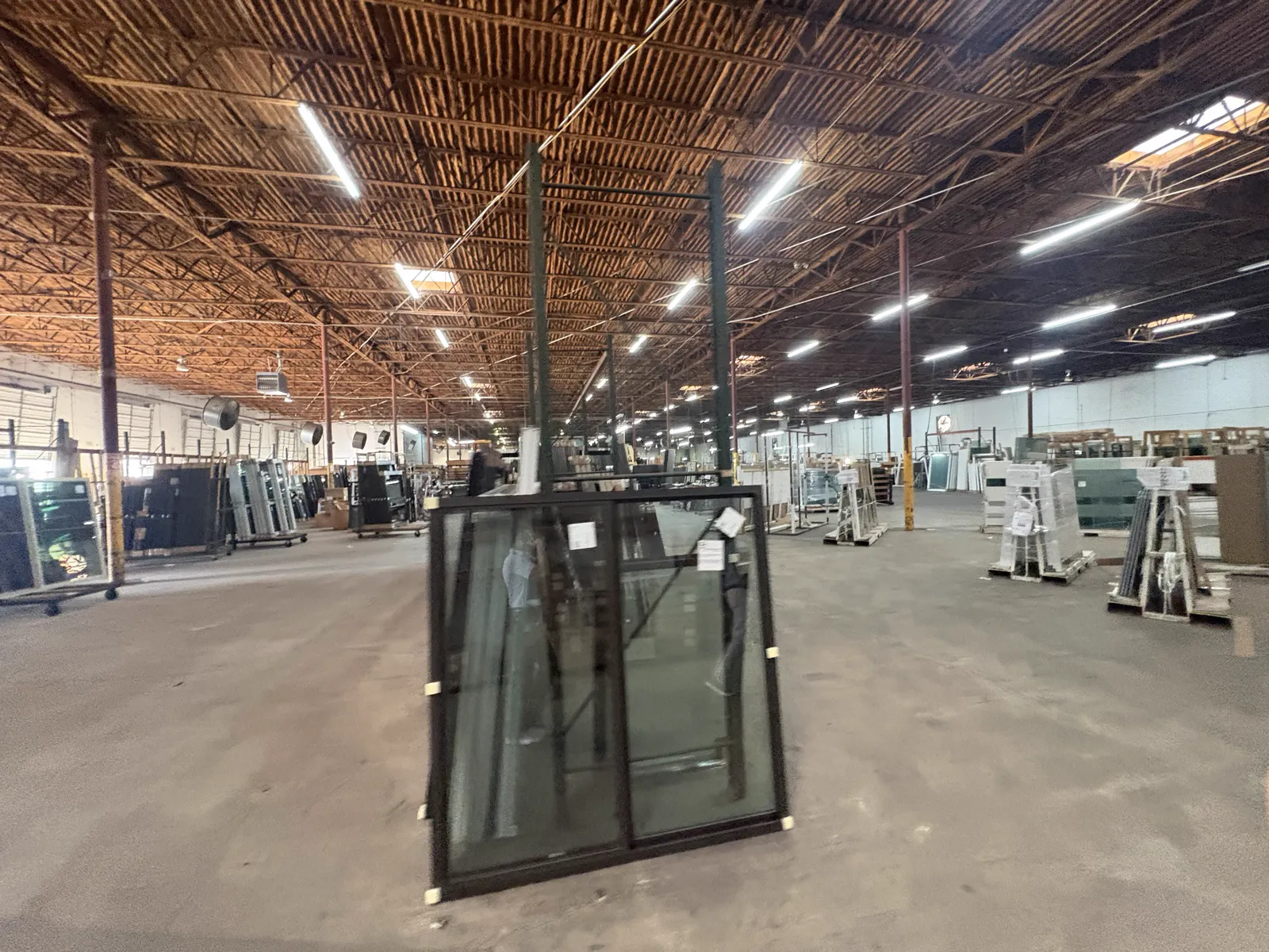 Custom aluminum storm windows being assembled in an American production facility
