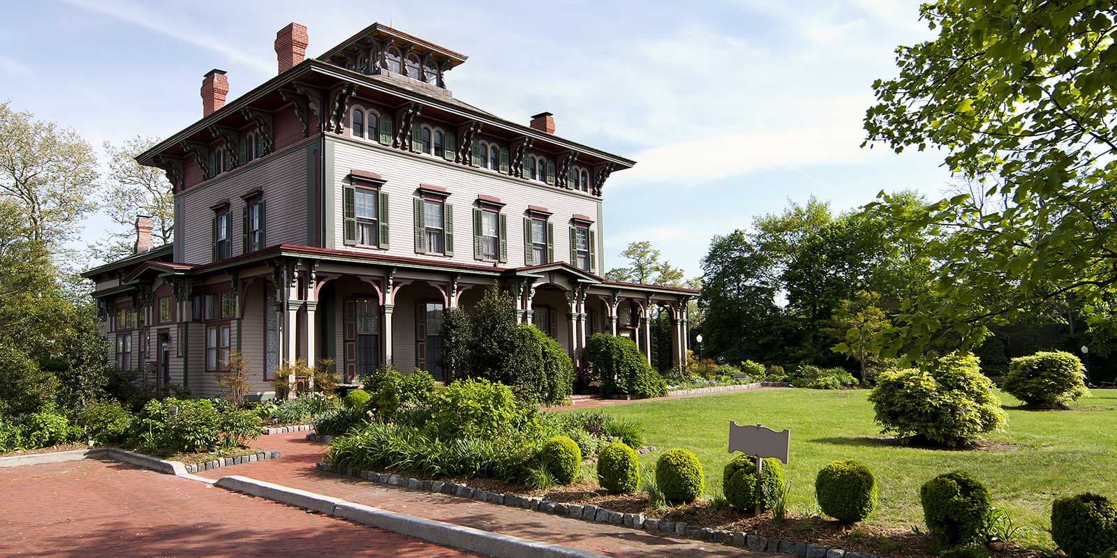 Historic home exterior with storm windows