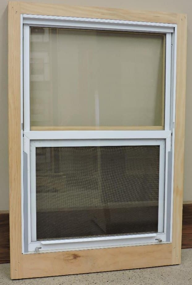 Interior view of a self-storing wood storm window