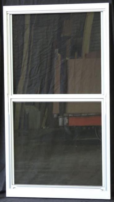 Painted self-storing wood storm window interior face