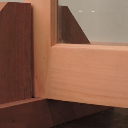 Traditional wood storm window center bar viewed from the interior