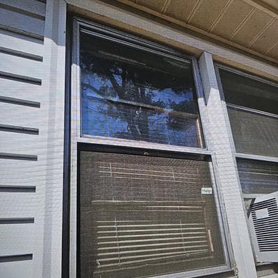 Black storm window installed at Matt’s Springfield home