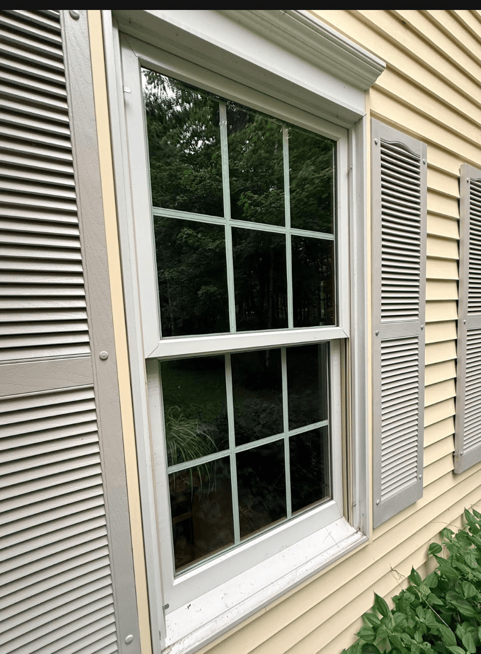 White storm window installed at Sarah’s Albany home