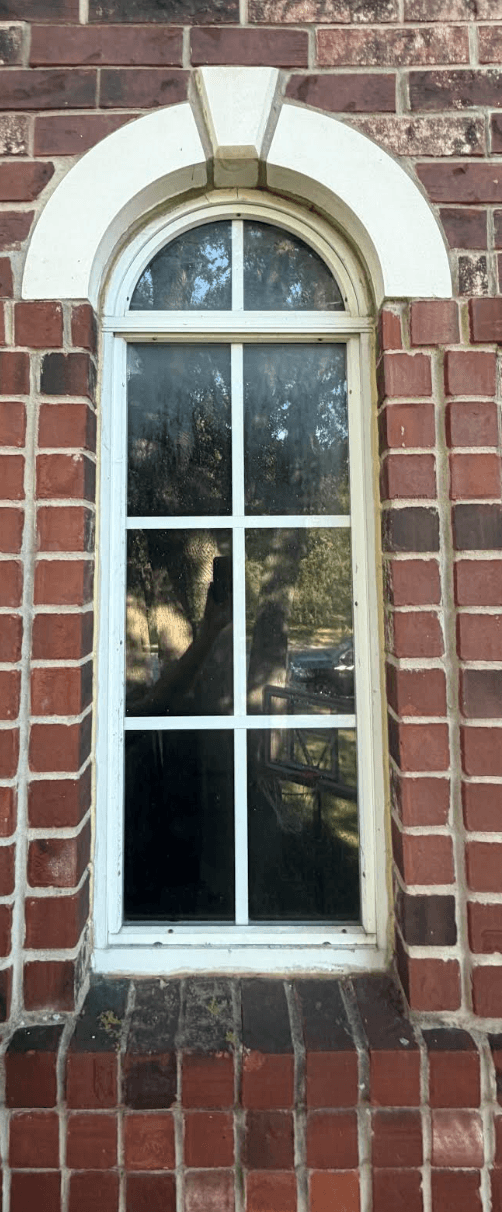 Arched storm window installed at Taylor’s Round Rock home