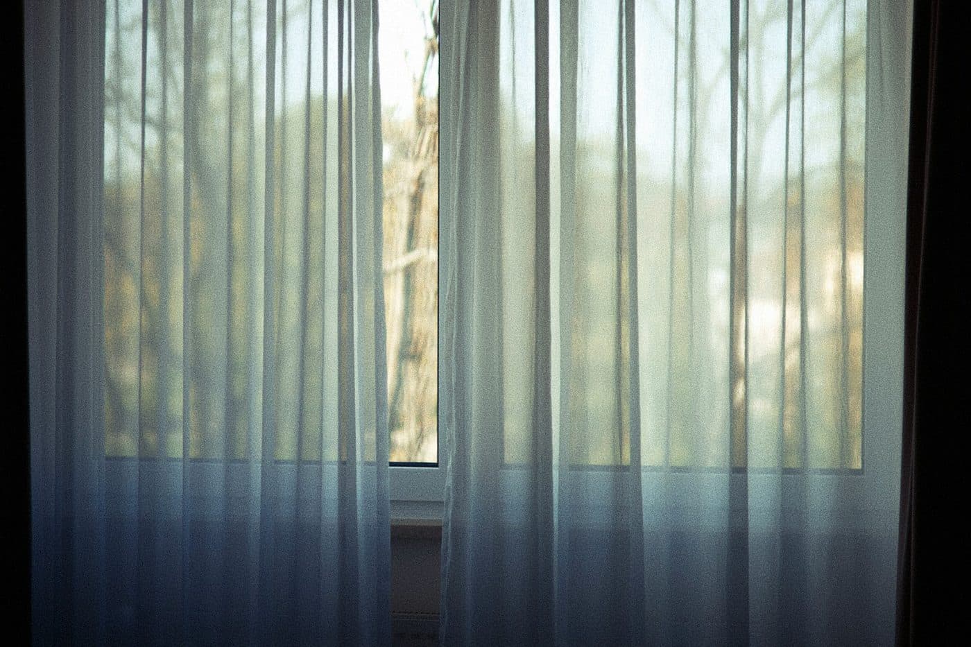 Sheer curtains in front of a window